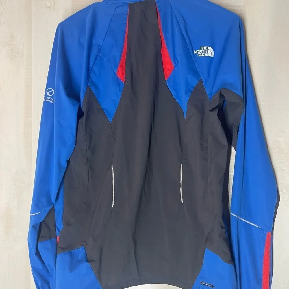 The North Face flight series blue black red jacket, size small‎